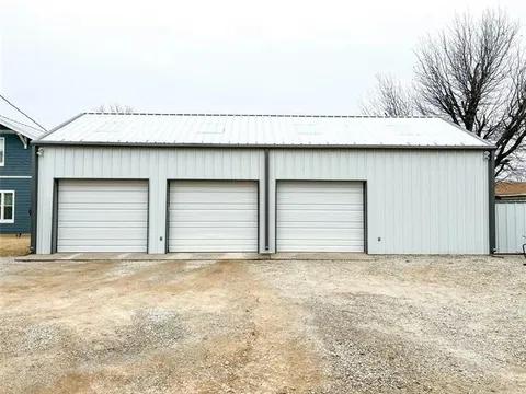 Custom steel building construction project showcasing industrial warehouse design